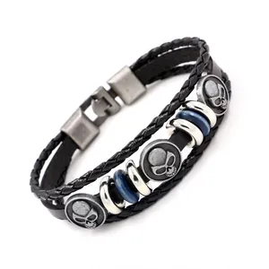 Bracelet multicouche en cuir pour homme avec breloques crâne vintage et cordon tressé