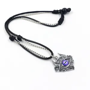 Gothic evil eye pendant necklace for men with skull motifs and purple dragon eye design
