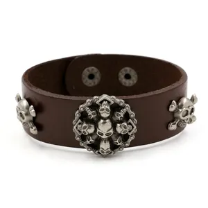 Bracelet punk large en cuir marron avec motifs de crâne en argent vintage et boutons-pression
