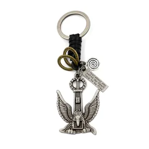 Retro eagle pendant keychain with braided black leather wrap and engraved metal plate