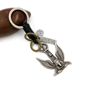 Vintage men's braided leather keychain with silver eagle pendant and engraved tag