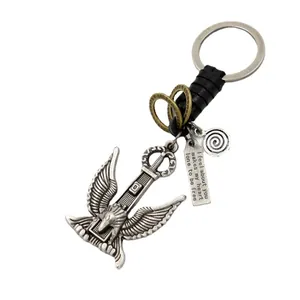 Vintage men's braided leather keychain with eagle pendant and sword in antique silver finish