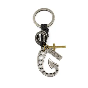 Vintage fishhook keychain with leather braid, cross pendant and engraved quote tag
