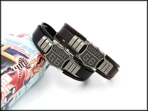 Detail of vintage Route 66 multi-layer leather bracelets in black and brown styles