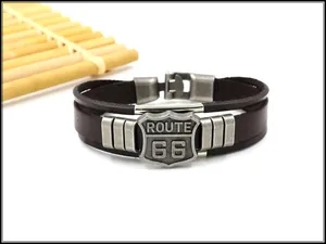 Close-up of a vintage Route 66 multi-layer brown leather bracelet with an alloy shield