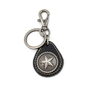 Vintage leather pentagram keychain with yellow stitching and silver metal lobster clasp