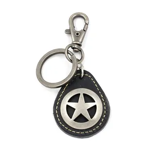 Llavero de cuero trenzado retro con colgante de estrella de cinco puntas plateada vieja
