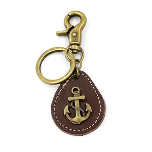 Portachiavi vintage in pelle e lega di zinco con ciondolo ad ancora e chiusura bronzo
