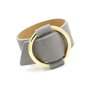 Gray lychee grain PU leather wide bracelet with a bold gold circular metal ring buckle