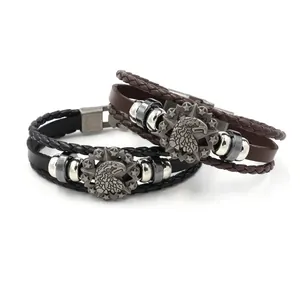 Men's braided leather bracelet featuring retro eagle head and star embossed alloy badge