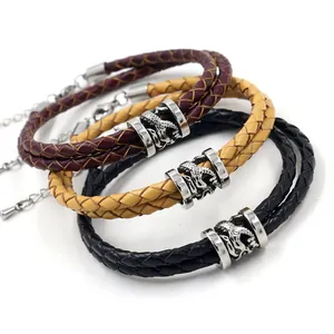 Driedelige set gevlochten lederen armbanden met zilveren drakentotem en verstelbare sluiting