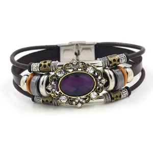 Vintage multilayer leather bracelet with purple gemstone and baroque metallic details