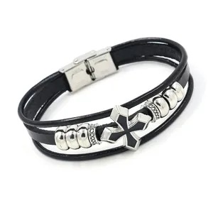 Pulsera multicapa de cuero negro con colgante de cruz y cierre de acero inoxidable