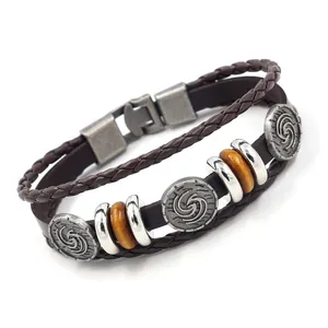 Retro multi-layer brown leather bracelet with vintage metal charms and wooden beads