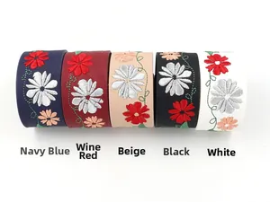 Detail showing five colors of embroidered flower PU leather wide bracelets with daisy patterns