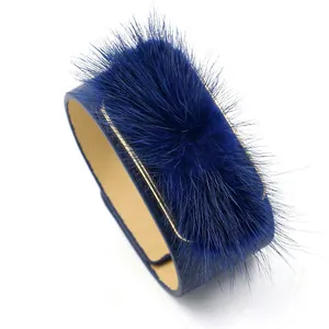 Navy blue wide faux leather bracelet featuring soft fur trim and high-quality finish
