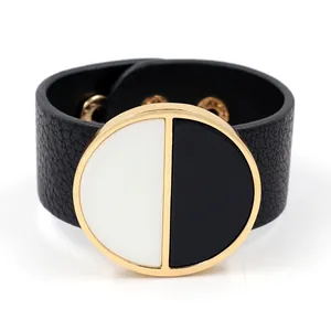 Schickes breites PU-Lederarmband mit großer schwarz-weißer Einlage und goldenem Metallelement