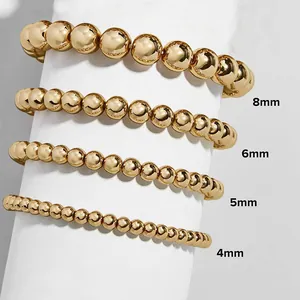 Detail of 18K gold stainless steel bead bracelets in 4mm, 5mm, 6mm, and 8mm sizes