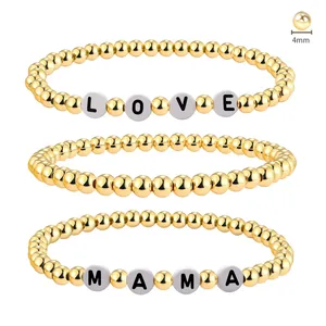 Detail of 4mm 18K gold stainless steel beaded bracelet set with LOVE and MAMA letters