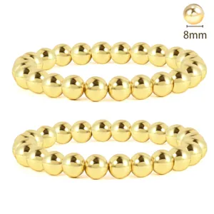 Detail of 18K gold stainless steel 8mm bead bracelet set with a polished mirror finish