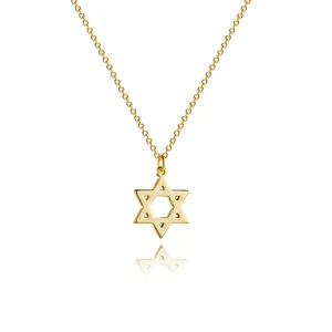 Macro detail of high-polished gold David Star pendant with a delicate link chain
