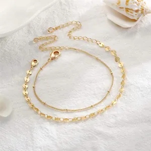 Detail of 18K gold plated double-layer stainless steel bead chain and lobster clasp