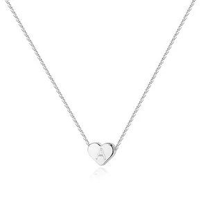 Detailed view of heart-shaped pendant with engraved letter A on a silver chain link