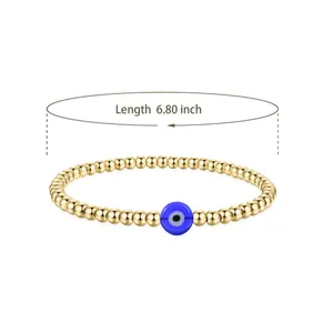 Detail showing the 6.80 inch length measurement of the golden evil eye bead bracelet