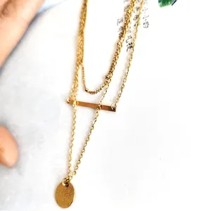 Collana a strati in acciaio inossidabile dorato con barra e ciondolo a moneta