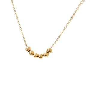 Minimalist 18K gold plated stainless steel necklace with six sliding round beads for women