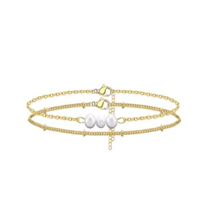 Dubbellaagse 18K vergulde roestvrijstalen kettingarmband met imitatieparels van 6 mm
