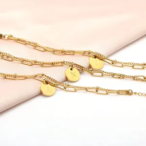 Dubbellaagse 18K vergulde paperclip en kralenketting armband met letterhangers