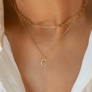 Close-up of double layer paperclip chain necklace with micro-pave zircon letter C pendant