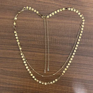 Double layered 18K gold plated beaded chain body necklace with shimmering round disk charms