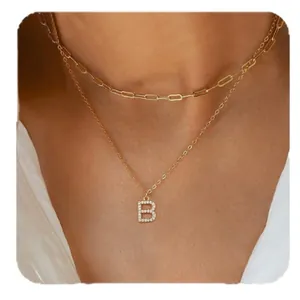 Double-layered gold paperclip chain necklace with zircon encrusted B-letter pendant