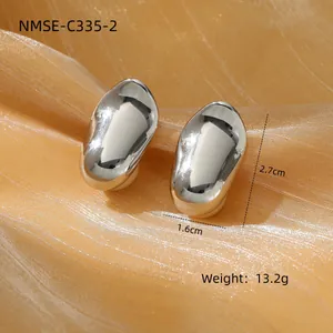 Close-up of C-shape brushed twist titanium earrings with 2.7cm size and weight details