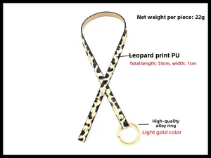 Detailansicht eines Wickelarmbands aus PU-Leder mit Leopardenmuster und Goldring