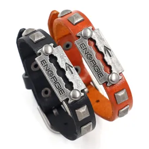 Punk leather bracelet set with retro rivets and metallic Energie plate in black and orange
