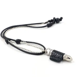 Collana con ciondolo a proiettile punk retrò con pelle nera e catena a doppio strato