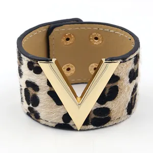 Fashionable leopard print pony hair wide cuff bracelet with a golden metal V-shaped buckle