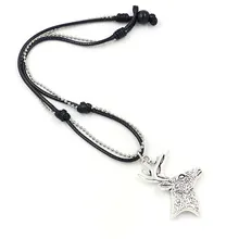 Close-up of retro silver deer head pendant with double-layer woven cord and bead chain