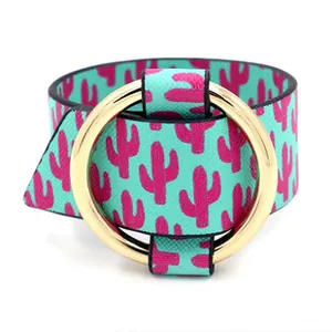 Detail of teal faux leather bracelet with pink cactus print and gold metal ring buckle