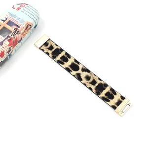 Fashionable wide leopard print cuff bracelet with a golden magnetic clasp for women