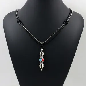 Ethnic vintage vajra pendant necklace with turquoise beads on silver bead and wax rope chain
