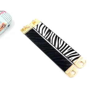 Modieuze brede armbanden van PU-leer met zebraprint en zwarte band met gouden gespen