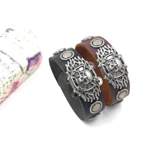 Vintage punk leather bracelets in black and brown with silver skull and flame metal relief