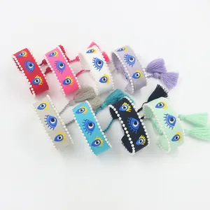 Adjustable evil eye embroidered woven bracelets with pearls and tassels in 8 colors