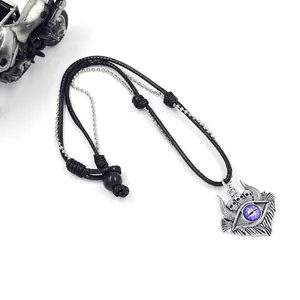 Gothic punk devil eye necklace featuring purple eye pendant with skull details