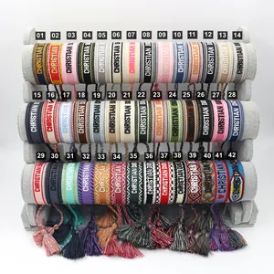 Handwoven embroidered bracelets in bohemian style with adjustable fringed tassels