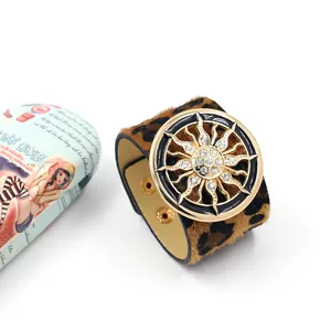 Fashionable leopard pony hair leather wide bracelet with gold sunburst rhinestone design